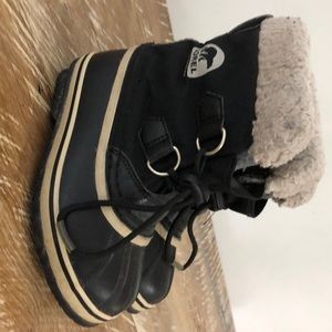 Kids Sorel snow boots.